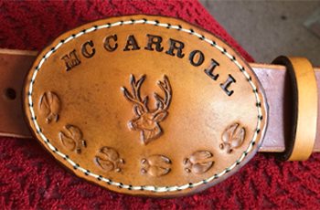 Belt Buckles Covered in Hand Tooled Leather